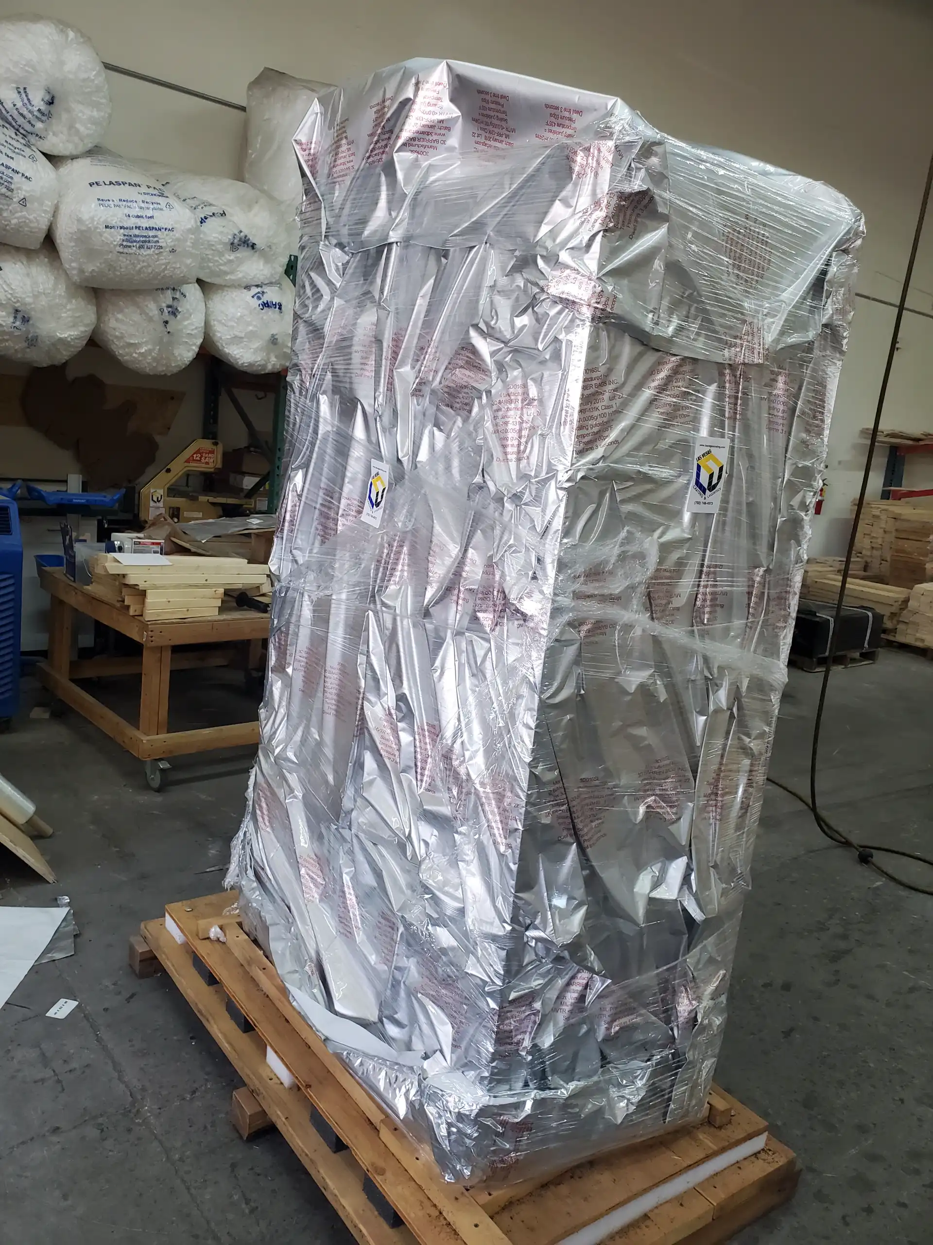 Close-up of vapor barrier foil wrap with moisture protection labeling